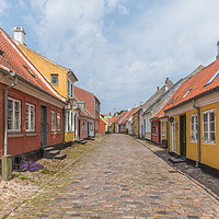Buy canvas prints of an idyllic street with cobblestone and old houses  by Stig Alenäs