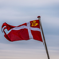 Buy canvas prints of Denmark Royal Post Flag  against the soft sky in t by Stig Alenäs