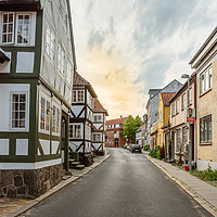 Buy canvas prints of Half-timbered houses along the road in the old cen by Stig Alenäs