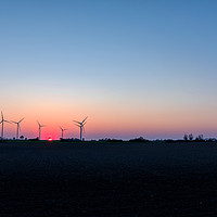 Buy canvas prints of windmills in the sunset over the plain by Stig Alenäs