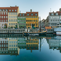 Buy canvas prints of Wonderful Copenhagen reflections in Nyhavn harbor by Stig Alenäs