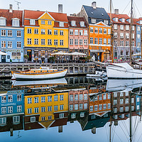 Buy canvas prints of Reflections of colourful houses in the water of Ny by Stig Alenäs