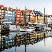 Buy canvas prints of Sailingboats and colourful houses reflecting in th by Stig Alenäs