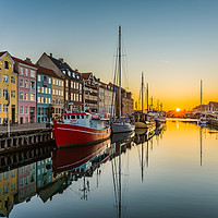 Buy canvas prints of The tranquil water of Nyhavn an early morning by Stig Alenäs
