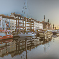 Buy canvas prints of Colourful houses in the sunrise along the quay at  by Stig Alenäs