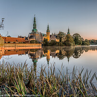 Buy canvas prints of Frederiksborg Castle with reeds in the foreground  by Stig Alenäs