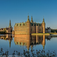 Buy canvas prints of Frederiksborg Castle in a mirror-gloss reflection at surise  by Stig Alenäs