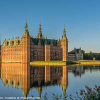 Buy canvas prints of The Royal Frederiksborg Castle in a mirror-gloss reflection at surise  by Stig Alenäs