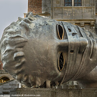Buy canvas prints of Bronze head in the main square, old town Krakow by Stig Alenäs
