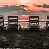 Buy canvas prints of The backside of four chairs close to the beach in the tropical s by Stig Alenäs