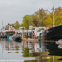 Buy canvas prints of Houseboats in Copenhagen reflecting in the canal  by Stig Alenäs