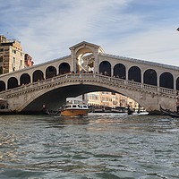Buy canvas prints of Venice Bridge view from a gondala. by Josh Bennett