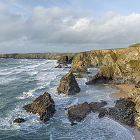 Buy canvas prints of Surf around Sea Stacks, Bedruthan Steps by Mick Blakey