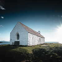 Buy canvas prints of St Cwyfans Church in Anglesey by Mark Jones