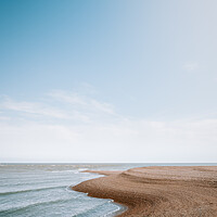 Beach Shoreline: Golden Pebbles, Azure Waters