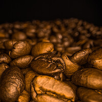Buy canvas prints of Freshly roasted Coffee Beans - macro shot by Erik Lattwein