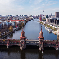 Buy canvas prints of River Spree in the city of Berlin with Oberbaum Bridge by Erik Lattwein