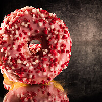 Buy canvas prints of Strawberry sugar doughnuts in close-up view - macro shot by Erik Lattwein