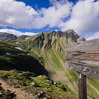 Buy canvas prints of Direction signs at Timmelsjoch High Alpine Road in the Austrian Alps also called Passo Rombo by Erik Lattwein