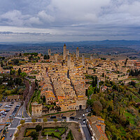 Buy canvas prints of Village of San Gigmignano in Tuscany Italy - aerial view by Erik Lattwein