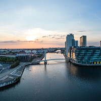 Buy canvas prints of Aerial view over Media City UK in Manchester by Erik Lattwein