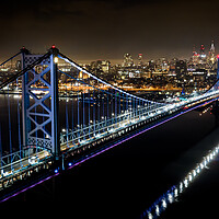 Buy canvas prints of Aerial view over Philadelphia and Ben Franklin Bridge at night - travel photography by Erik Lattwein