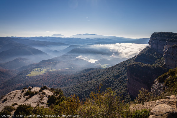 The fog dissipates in the mountains and valleys Picture Board by Jordi Carrio