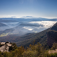 Buy canvas prints of The fog dissipates in the mountains and valleys by Jordi Carrio