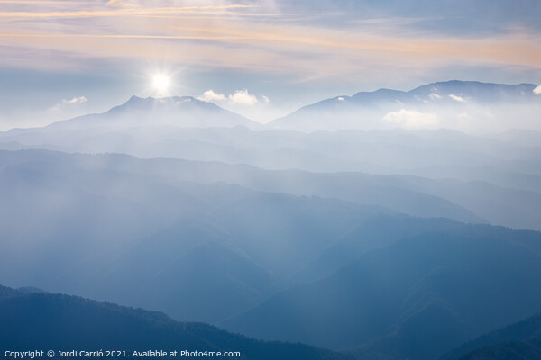 A dim sunrise with fog. Picture Board by Jordi Carrio