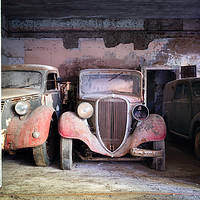 Buy canvas prints of Abandoned Vintage Cars in Garage by Roman Robroek