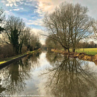 Buy canvas prints of Autumn reflections on the Kennet and Avon Canal by Simon Marlow