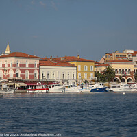 Buy canvas prints of The stylish houses at the waterfront of Rovinj in  by Simon Marlow
