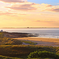 Buy canvas prints of Golden Hour at Bamburgh Castle by Simon Marlow