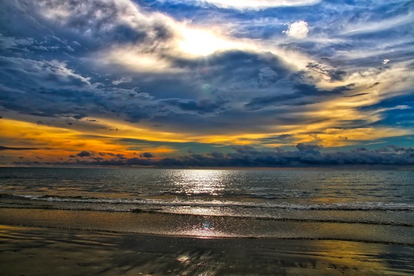 Borneo seascape at sunset Picture Board by Simon Marlow