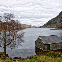 Buy canvas prints of The cabin on the lake at Ogwen by Simon Marlow
