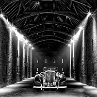 Buy canvas prints of Classic MG lit up in a barn by Simon Marlow