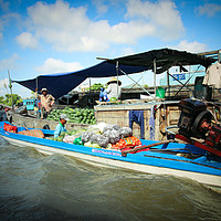Buy canvas prints of River boat on the Mekong Delta at Hoi An by Simon Marlow