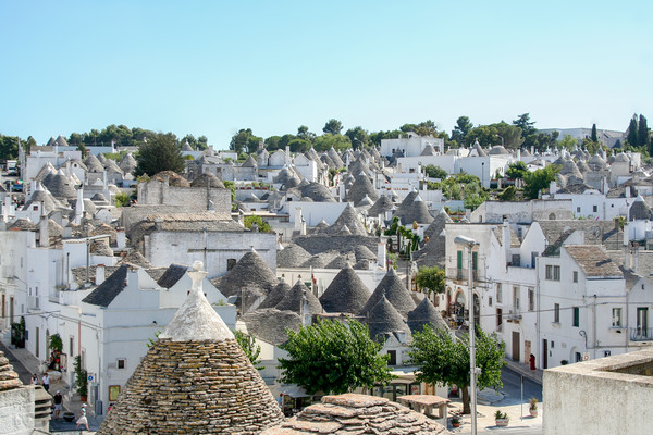 Enchanting Conical Trulli Village Picture Board by Simon Marlow