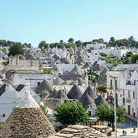 Buy canvas prints of Enchanting Conical Trulli Village by Simon Marlow