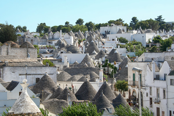 Traditional Trulli houses in Alberobello Picture Board by Simon Marlow