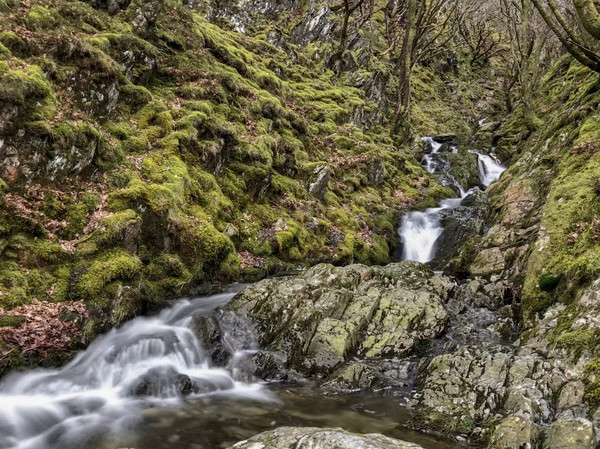Stream running down in the Elan Valley, Wales Picture Board by Simon Marlow