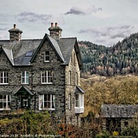 Buy canvas prints of Cottage by the river in Betws-y-Coed, North Wales by Simon Marlow