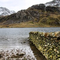 Buy canvas prints of Majestic Llyn Idwal Peaceful Haven Amidst Snowdoni by Simon Marlow