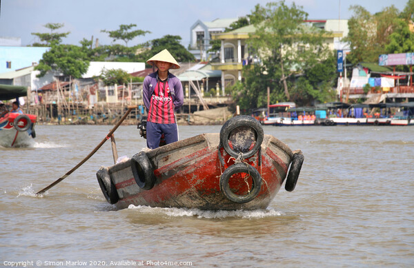 Small boat on the Mekong Delta at Tra On Picture Board by Simon Marlow