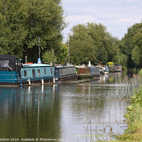 Buy canvas prints of Barges moored on the Kennet and Avon Canal by Simon Marlow
