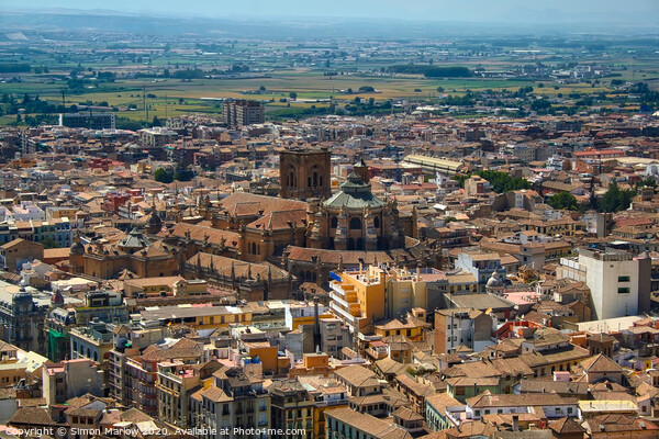 Looking down across Granada in Spain Picture Board by Simon Marlow
