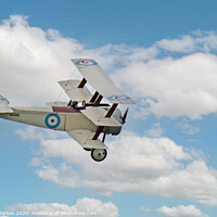 Buy canvas prints of Sopwith Triplane flying past at White Waltham by Simon Marlow