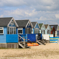 Buy canvas prints of Charming Beach Huts at Hengistbury Head by Simon Marlow
