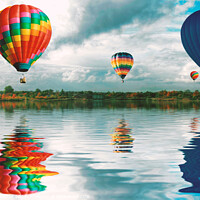Buy canvas prints of Hot Air Balloons reflecting over water by Simon Marlow