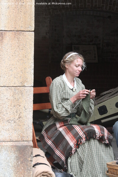 Woman Knitting, Civil War reenactment, San Francisco Picture Board by Arun 